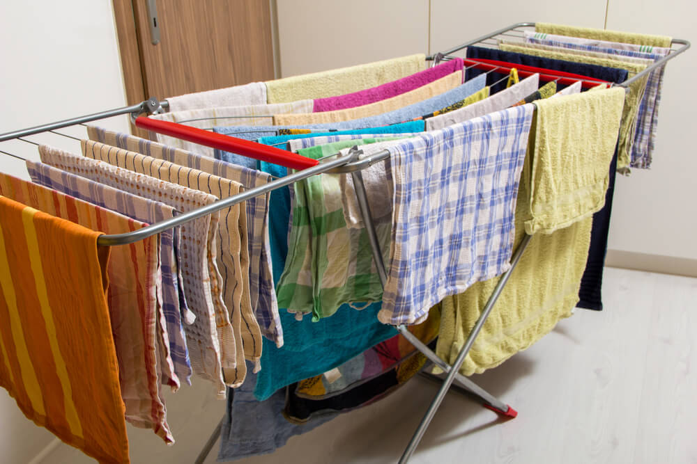 clothes drying inside in a drying rack