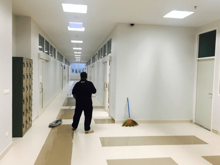 a janitor cleaning a office corridor in Bartlett, Illinois