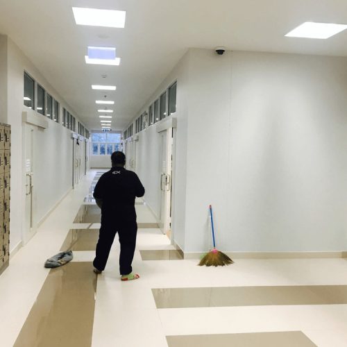 a janitor cleaning a office corridor in Bartlett, Illinois