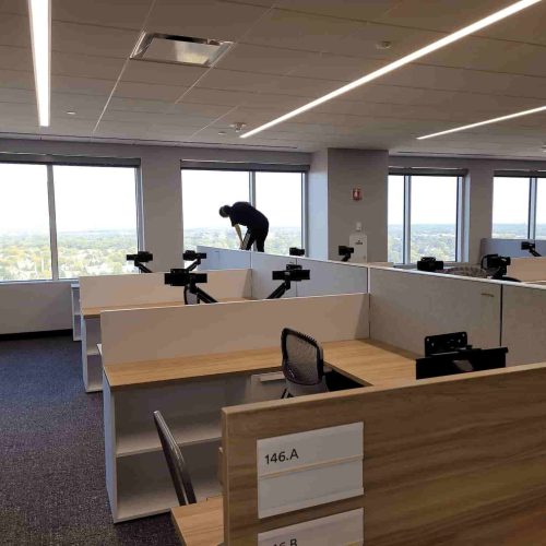 professional cleaner cleaning a office windows during office cleaning services in Bartlett Il